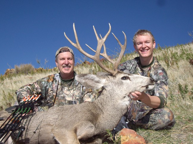 My 07 archery buck & my son Cody